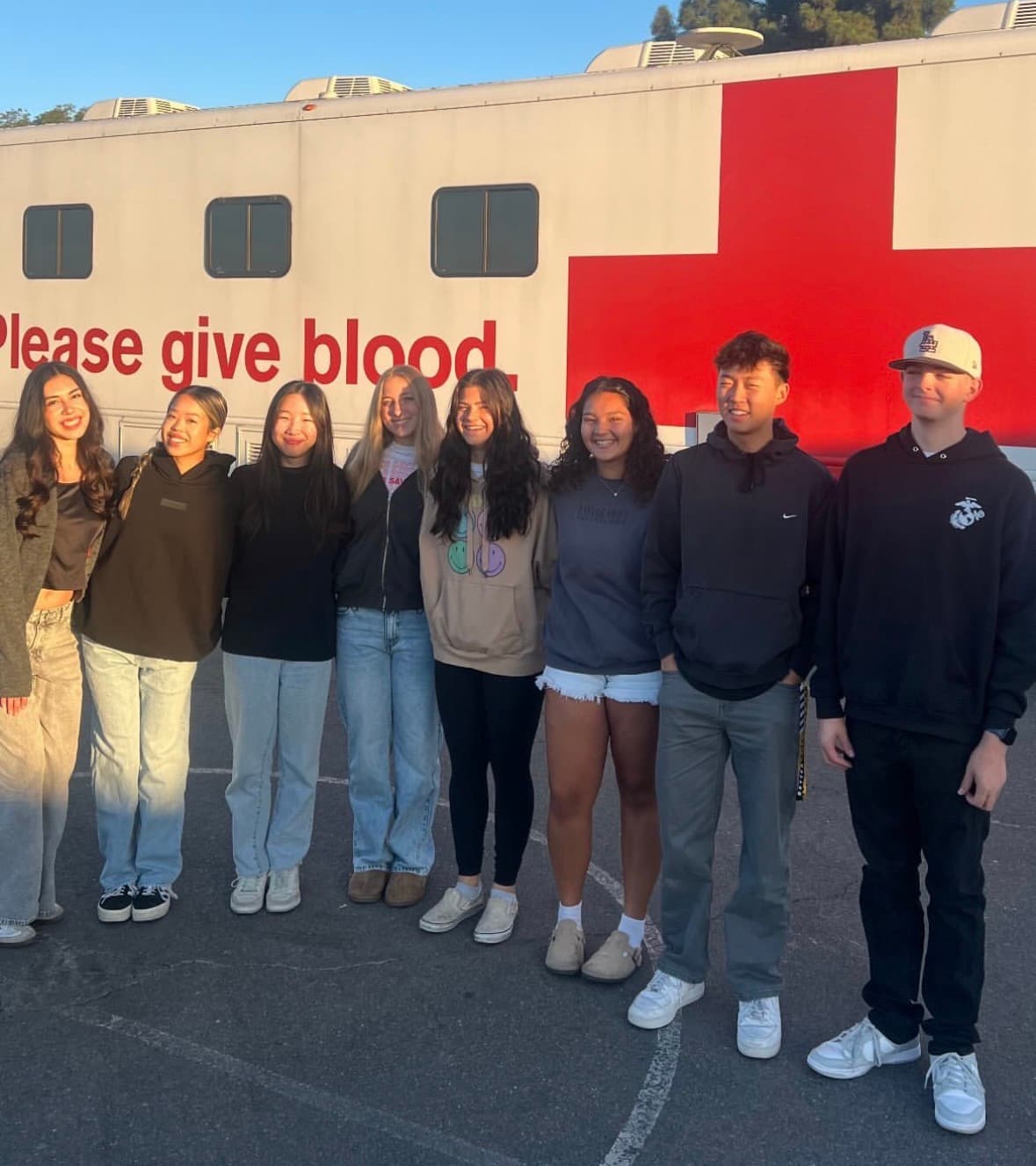 The team after a blood drive, with Red Cross Club officers and volunteers
